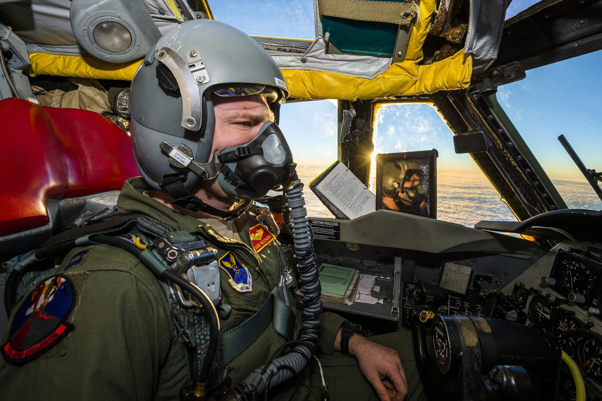 Capt. Dane Weathers, 23rd Bomb Squadron aircraft commander, pilots a B-52H Stratofortress above the clouds in North Dakota airspace, Jan. 31, 2017. Weathers and Capt. Jonathan Gabriel, 23rd BS aircraft commander, relied on their offensive and defensive team to successfully complete their training mission. (U.S. Air Force photo/Senior Airman J.T. Armstrong)