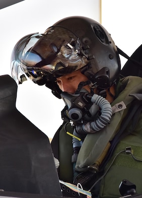 Lt. Col. Nakano, Japan Air Self-Defense Force F-35A national representative pilot to Luke, sits in the cockpit of one of three F-35s on 944th Fighter Wing’s ramp area Feb. 7 before departing on his first solo sortie at Luke Air Force Base, Ariz. (U.S. Air Force photo taken by Tech. Sgt. Louis Vega Jr.)