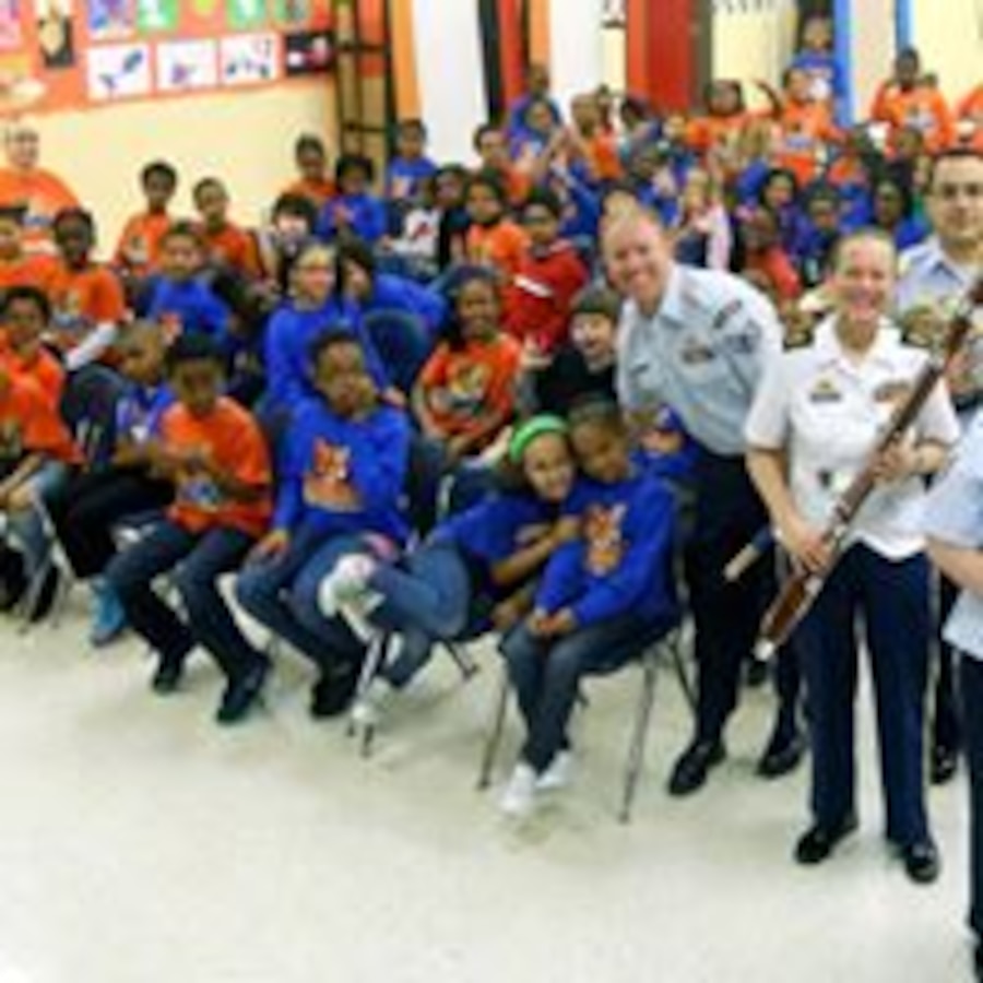 Members of the USAF Langley Winds perform for local  school children in the Hampton, Virginia area.