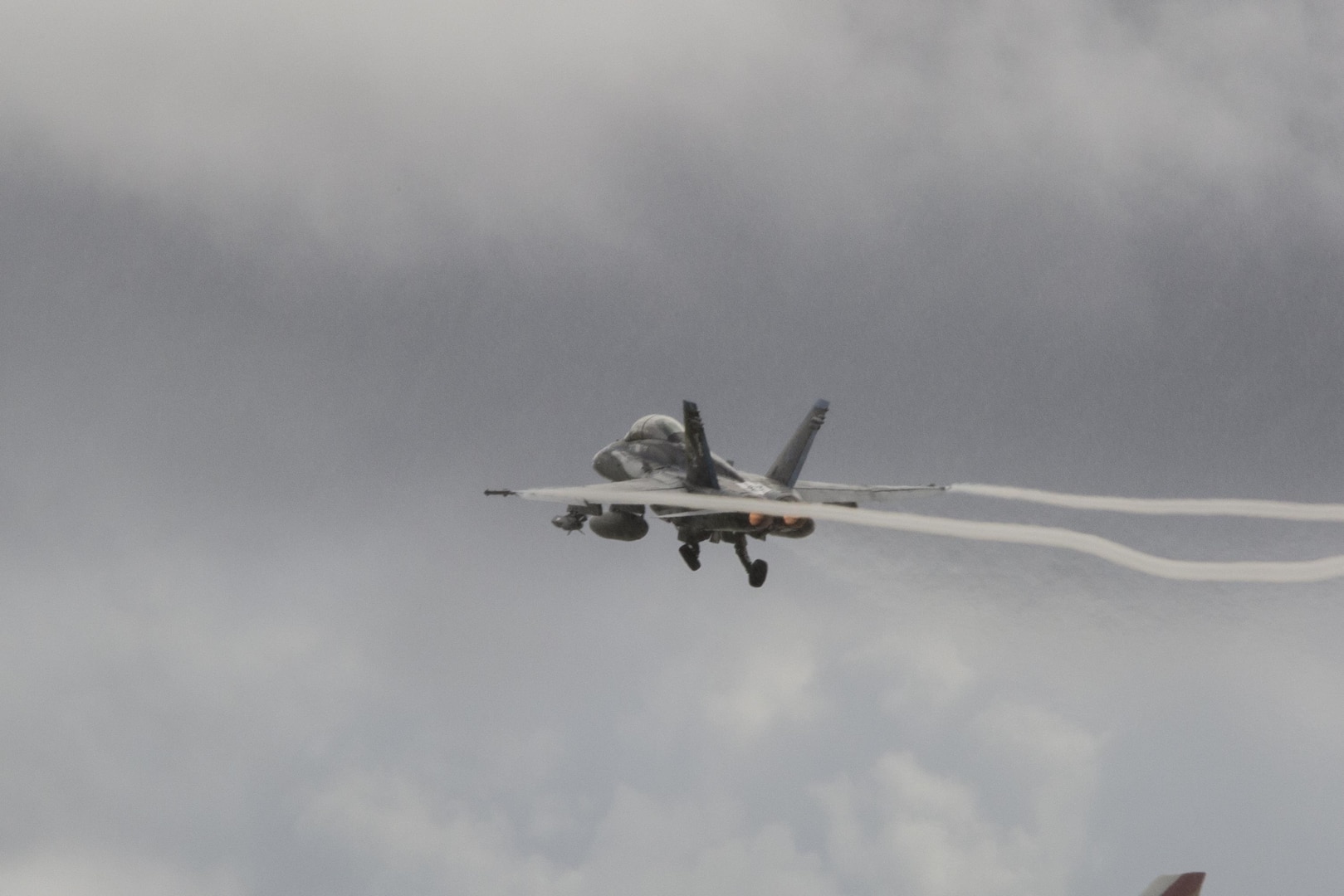 An F/A-18D Hornet with Marine All-Weather Fighter Attack Squadron (VMFA) – 225 takes flight during exercise Cope North at Andersen Air Force Base, Guam, Feb. 9, 2017. The Marines loaded live air intercept missile – 120 advanced medium-range air-to-air missiles (AIM-120 AMRAAM) to F/A-18D Hornets to be fired at decoys down range.