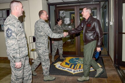 U.S. Air Force Col. George T.M. Dietrich III and Command Chief Master Sgt. Gary Berry, 673rd Air Base Wing commander and command chief, greet U.S. Air Force Gen. Terrence J. O'Shaughnessy, Pacific Air Forces commander, as he toured Joint Base Elmendorf-Richardson, Alaska, Feb. 7, 2017. O’Shaughnessy toured various facilities throughout the installation to meet with Airmen and get a first-hand look at the broad spectrum of JBER mission sets. 