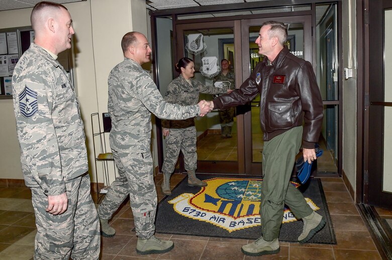 U.S. Air Force Col. George T.M. Dietrich III and Command Chief Master Sgt. Gary Berry, 673rd Air Base Wing commander and command chief, greet U.S. Air Force Gen. Terrence J. O'Shaughnessy, Pacific Air Forces commander, as he toured Joint Base Elmendorf-Richardson, Alaska, Feb. 7, 2017. O’Shaughnessy toured various facilities throughout the installation to meet with Airmen and get a first-hand look at the broad spectrum of JBER mission sets. 