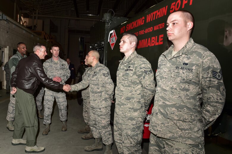 U.S. Air Force Gen. Terrence J. O'Shaughnessy, Pacific Air Forces commander, left, shakes hands with Airmen assigned to the 773rd Logistics Readiness Squadron at the Joint Readiness Complex on Joint Base Elmendorf-Richardson, Alaska, as he toured the base, Feb. 7, 2017. O’Shaughnessy toured various facilities throughout the installation to meet with Airmen and get a first-hand look at the broad spectrum of JBER mission sets. 