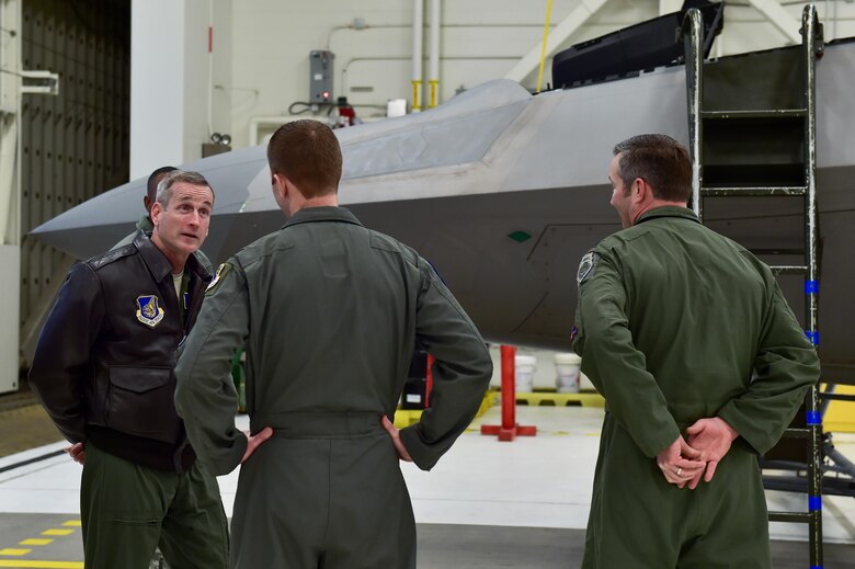 U.S. Air Force Gen. Terrence J. O'Shaughnessy, Pacific Air Forces commander, interacts with Airmen at the 525th Fighter Squadron in front of an F-22 Raptor on Joint Base Elmendorf- Richardson, Alaska, as he tours the base, Feb. 7, 2017. O’Shaughnessy also held an all-call to speak to Airmen about several topics including leadership philosophies, command priorities, and what Airmen can expect from him as well as what he expects from Airmen. 