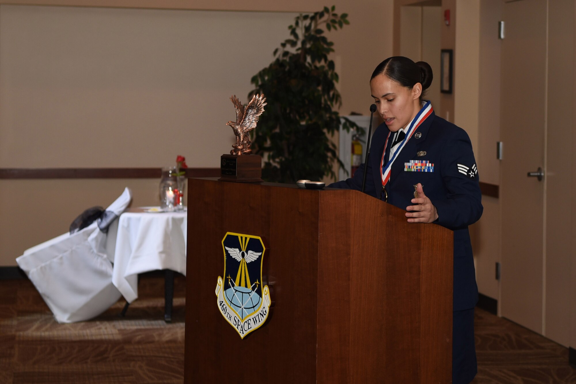 Senior Airman Crystal Velasquez, 460th Security Forces Squadron military working dog handler, presents a speech to her fellow Airman Leadership School classmates during their graduation Feb. 9, 2017, at the Leadership Develop Center on Buckley Air Force Base, Colo. Velasquez was presented with the prestigious John L. Levitow award, which is the highest award achievable in Professional Military Education. (U.S. Air Force photo by Airman Holden S. Faul/Released)