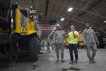 U.S. Air Force Chief Master Sgt. Anthony Johnson, left, Pacific Air Forces (PACAF) command chief, inspects snow removal vehicles belonging to the 773rd Civil Engineer Squadron while touring Joint Base Elmendorf-Richardson, Alaska, Feb. 7, 2017. PACAF leadership toured various facilities throughout the installation to meet with Airmen and get a first-hand look at the broad spectrum of JBER mission sets. 
