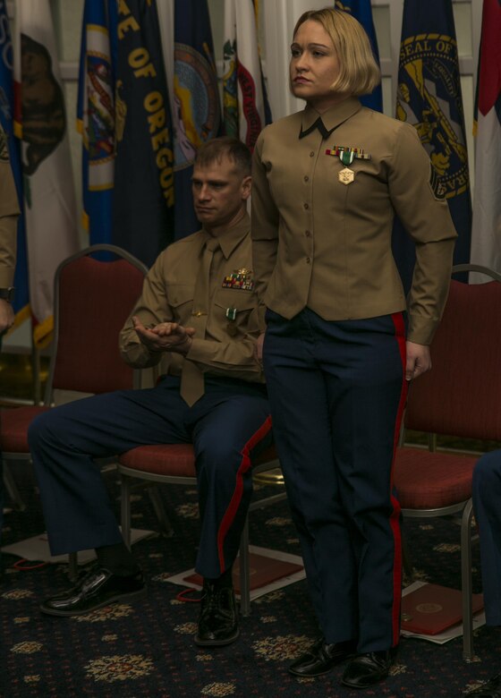 Staff Sgt. Christin J. McAdams with 6th Communications Battalion, Force Headquarters Group, stands at attention to be recognized as the Active Reserve Career Planner of the Year during the annual Commandant of the Marine Corps’ 2016 Combined Awards Ceremony, Feb. 8, 2017, in Quantico, Va.  McAdams, along with the Active Reserve Career Planner of the Year runner-up, Staff Sgt. Jaim W. Bourg with 4th Reconnaissance Battalion, 4th Marine Division, were awarded the Navy and Marine Corps Commendation Medal for their hard work and dedication. 