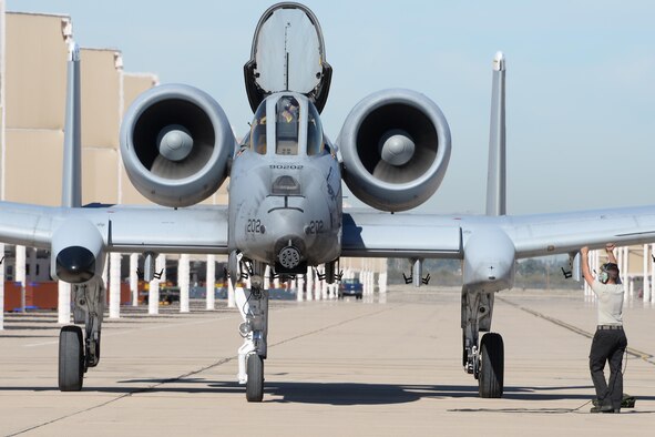 An A-10C Thunderbolt II taxis down the flightline after flying in the 2017 Heritage Flight Training and Certification Course at Davis-Monthan Air Force Base, Ariz., Feb., 10, 2017. The HFTCC provides civilian and military pilots the opportunity to practice flying in formation together in preparation for future air shows. (U.S. Air Force photo by Senior Airman Ashley N. Steffen)