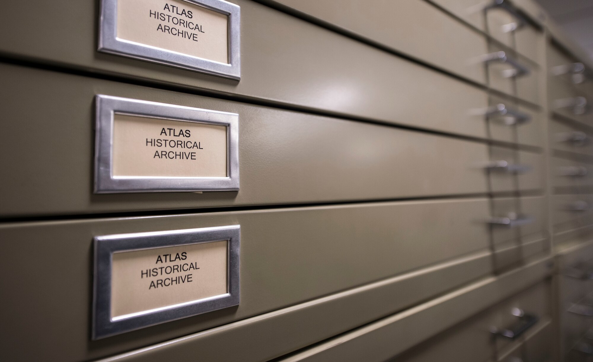 Record cabinets line the wall of the Air Force Nuclear Weapons Center infrastructure and equipment divisions building at F.E. Warren Air Force Base, Wyo., Feb. 1, 2017. In the building’s library, historical files can be found on current and past missile systems to include the Atlas and Peacekeeper missiles. The Infrastructure and Equipment Division ensures that facility and infrastructure requirements are in place to support the intercontinental ballistic missile systems across every missile complex.  (U.S. Air Force photo by Staff Sgt. Christopher Ruano)