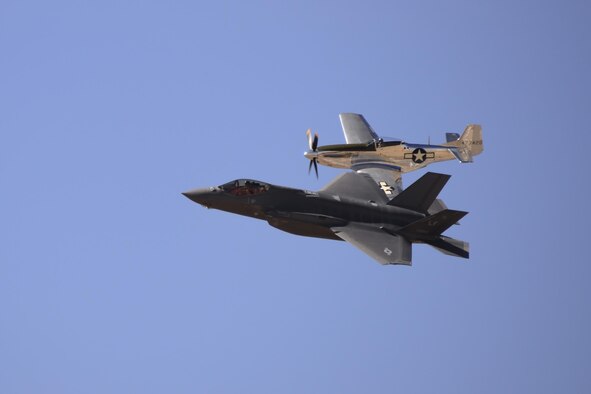 A U.S. Air Force F-35 Lightning II and a P-51 Mustang fly in formation during the 2017 Heritage Flight Training and Certification Course at Davis-Monthan Air Force Base, Ariz., Feb. 10, 2017. The modern aircraft that participated in this year’s HFTCC were the F-35 Lightning II, the F-22 Raptor, F-16 Fighting Falcon and the A-10C Thunderbolt II. The historic aircraft included the P-51 and T-51 Mustangs, the P-40 Warhawk, the P-38 Lightning, the P-47 Thunderbolt, the T-33 Shooting Star and the F-86 Sabre. (U.S. Air Force photo by Senior Airman Betty R. Chevalier)