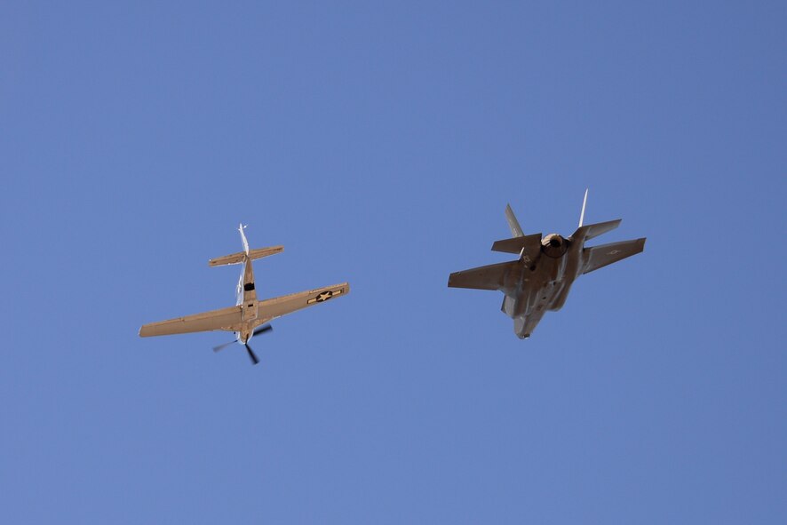 A U.S. Air Force A-10C Thunderbolt II and a P-47 Thunderbolt fly in formation during the 2017 Heritage Flight Training and Certification Course at Davis-Monthan Air Force Base, Ariz., Feb. 10, 2017. During the course, aircrews practice ground and flight training to enable civilian pilots of historic military aircraft and U.S. Air Force pilots of current fighter aircraft to fly safely in formations together. (U.S. Air Force photo by Senior Airman Betty R. Chevalier)