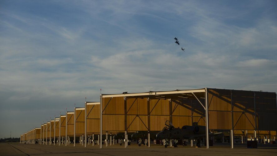 A U.S. Air Force F-22 Raptor, F-35 Lightning II and F-86 Sabre fly in formation during the 2017 Heritage Flight Training and Certification Course at Davis-Monthan Air Force Base, Ariz., Feb. 10, 2017. The 20th annual training event has been held at D-M since 2001 and features aerial demonstrations from historical and modern fighter aircraft. (U.S. Air Force photo by Senior Airman Chris Drzazgowski)