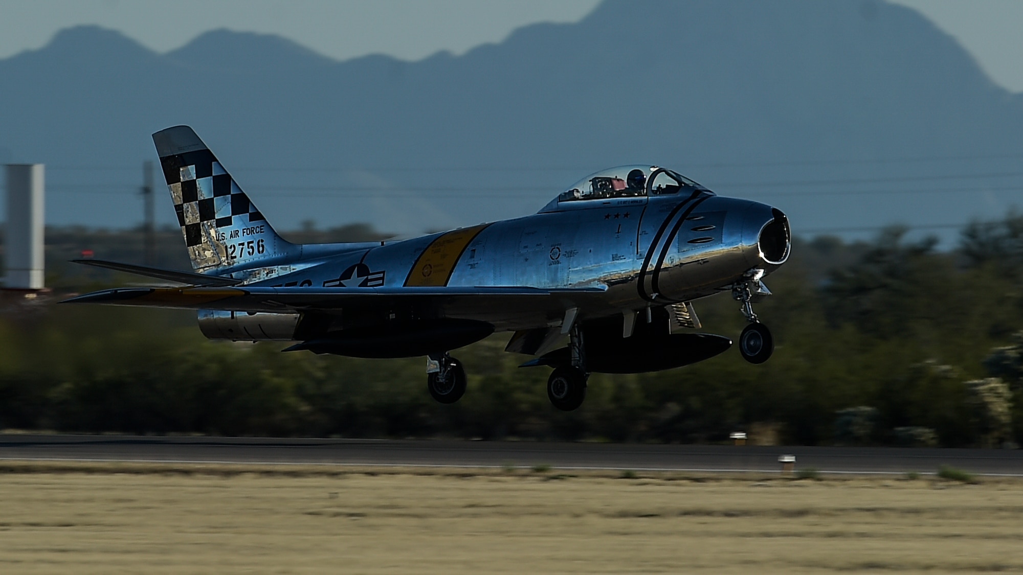 An F-86 Sabre takes off during the 2017 Heritage Flight Training and Certification Course at Davis-Monthan Air Force Base, Ariz., Feb. 10, 2017. The first production model of the F-86 flew in 1948 and supported the Strategic Air Command from 1949 to 1950. (U.S. Air Force photo by Senior Airman Chris Drzazgowski)