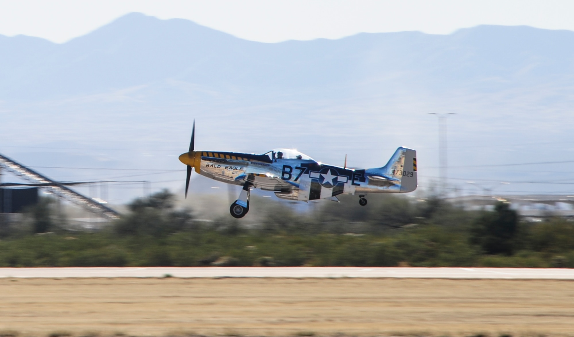 A P-51 Mustang takes off during the 2017 Heritage Flight Training and Certification Course at Davis-Monthan Air Force Base, Ariz., Feb. 10, 2017. Established in 1997, the HFTCC certifies civilian pilots of historic military aircraft and U.S. Air Force pilots to fly in formation together during the upcoming air show season. (U.S. Air Force Photo by Airman 1st Class Nathan H. Barbour)