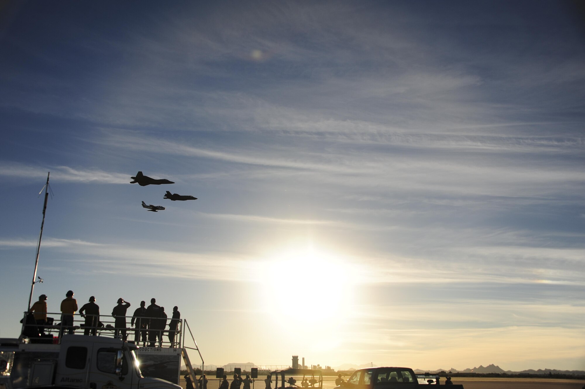 A U.S. Air Force F-35 Lightning II, F-22 Raptor and an F-86 Sabre fly above spectators during the 2017 Heritage Flight Training and Certification Course at Davis-Monthan Air Force Base, Ariz., Feb. 10, 2017. The HFTCC provides civilian and military pilots the opportunity to practice flying in formation together in preparation for future air shows. (U.S. Air Force Photo by Airman 1st Class Nathan H. Barbour)