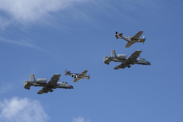 Two U.S. Air Force A-10C Thunderbolt IIs, a P-51 Mustang and a P-40 Warhawk fly in formation during the 2017 Heritage Flight Training and Certification Course at Davis-Monthan Air Force Base, Ariz., Feb. 10, 2017. Established in 1997, the HFTCC certifies civilian pilots of historic military aircraft and U.S. Air Force pilots to fly in formation together during the upcoming air show season. (U.S. Air Force photo by Airman 1st Class Mya M. Crosby)
