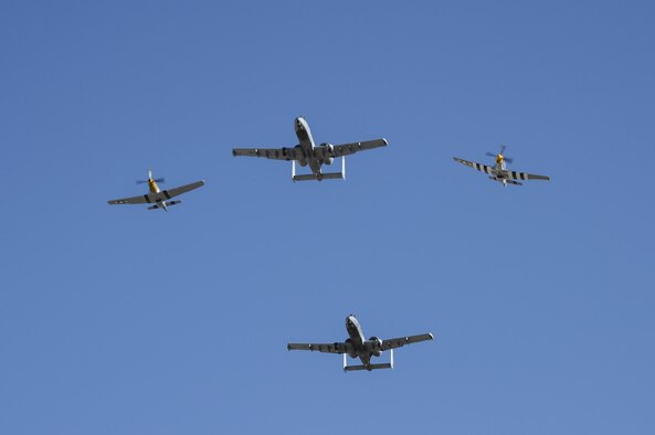 Two U.S. Air Force A-10C Thunderbolt IIs, a P-51 Mustang and a P-40 Warhawk fly in formation during the 2017 Heritage Flight Training and Certification Course at Davis-Monthan Air Force Base, Ariz., Feb. 10, 2017. Established in 1997, the HFTCC certifies civilian pilots of historic military aircraft and U.S. Air Force pilots to fly in formation together during the upcoming air show season. (U.S. Air Force photo by Airman 1st Class Mya M. Crosby)