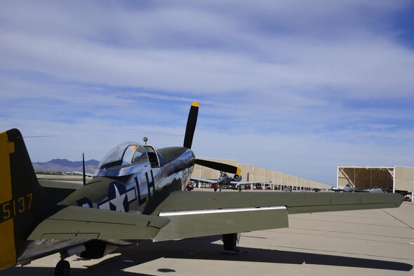 A TF-51 Mustang and a U.S. Air Force A-10C Thanderbolt II sit on the flight line during the 2017 Heritage Flight Training and Certification Course at Davis-Monthan Air Force Base, Ariz., Feb. 11, 2017. The HFTCC provides civilian and military pilots the opportunity to practice flying in formation together in preparation for future air shows. (U.S. Air Force photo by Senior Airman Betty R. Chevalier)