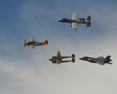 A U.S. Air Force A-10C Thunderbolt II and a F-35 Lightning II fly in formation with a P-47 Thunderbolt and a P-38 Lightning during the 2017 Heritage Flight Training and Certification Course at Davis-Monthan Air Force Base, Ariz., Feb. 11, 2017. The annual aerial demonstration training event has been held at D-M since 2001. (U.S. Air Force photo by Senior Airman Ashley N. Steffen)