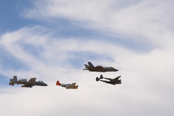 A U.S. Air Force A-10C Thunderbolt II and a F-35 Lightning II fly in formation with a P-47 Thunderbolt and a P-38 Lightning during the 2017 Heritage Flight Training and Certification Course at Davis-Monthan Air Force Base, Ariz., Feb. 11, 2017. During the course, aircrews practice ground and flight training to enable civilian pilots of historic military aircraft and U.S. Air Force pilots of current fighter aircraft to fly safely in formations together. (U.S. Air Force photo by Senior Airman Ashley N. Steffen)