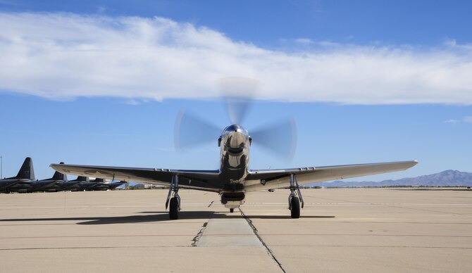 A P-51 Mustang stages on the flight line during the 2017 Heritage Flight Training and Certification Course at Davis-Monthan Air Force Base, Ariz., Feb. 11, 2017. During the course, aircrews practice ground and flight training to enable civilian pilots of historic military aircraft and U.S. Air Force pilots of current fighter aircraft to safely fly in formations together. (U.S. Air Force Photo by Airman 1st Class Nathan H. Barbour)
