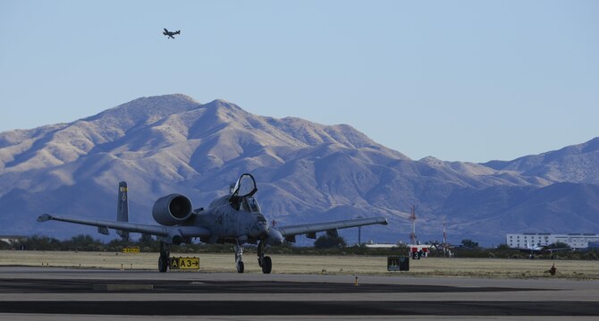 A U.S. Air Force A-10C Thunderbolt II taxies on the flight line during the 2017 Heritage Flight Training and Certification Course at Davis-Monthan Air Force Base, Ariz., Feb. 9, 2017. The HFTCC provides civilian and military pilots the opportunity to practice flying in formation together in preparation for future air shows. (U.S. Air Force Photo by Airman 1st Class Nathan H. Barbour)