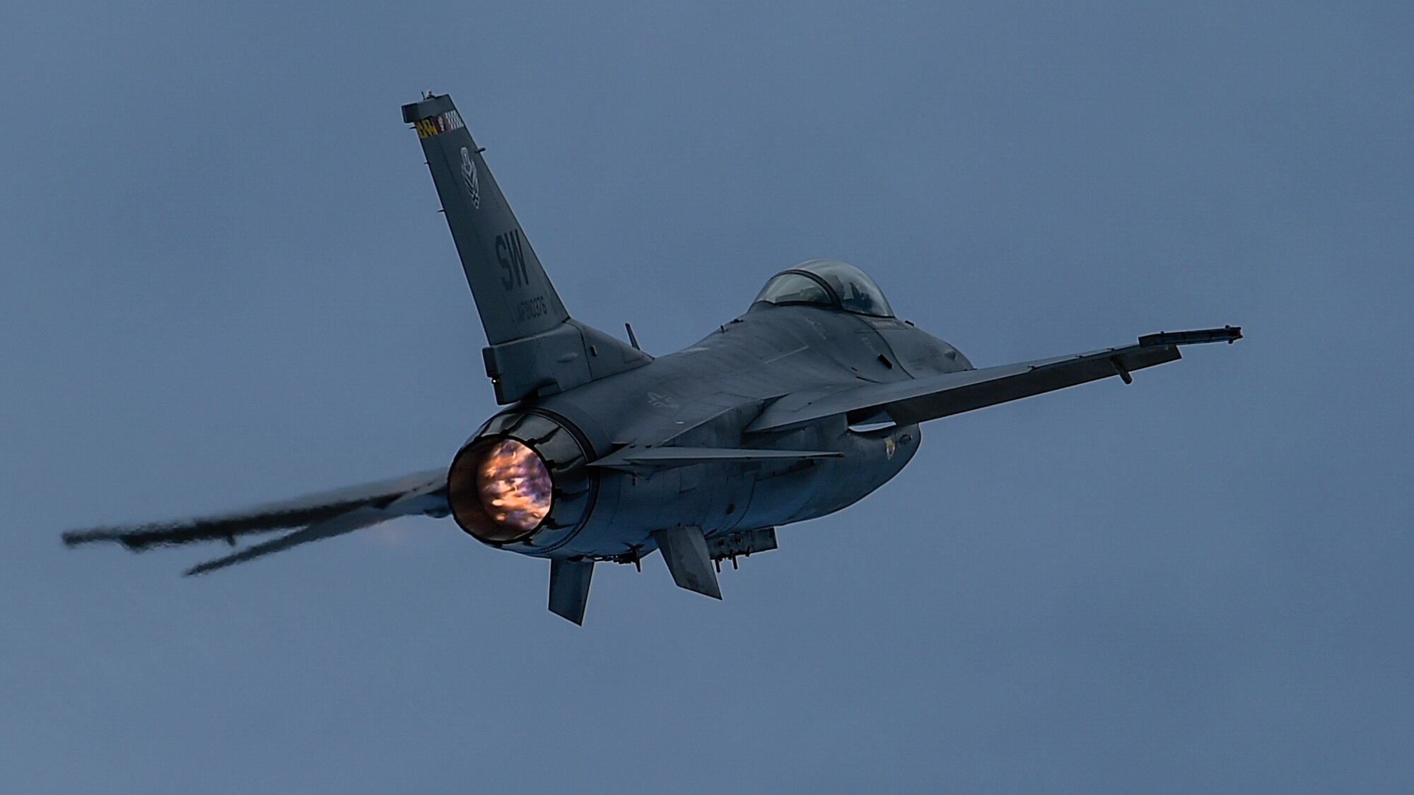 A U.S. Air Force F-16 Fighting Falcon utilizes its afterburner during the 2017 Heritage Flight Training and Certification Course at Davis-Monthan Air Force Base, Ariz., Feb. 11, 2017. The F-16 is highly maneuverable and has proven itself in air-to-air combat and air-to-surface attack. It provides a relatively low-cost, high performance weapon system for the U.S. and its allied nations. (U.S. Air Force photo by Senior Airman Chris Drzazgowski)