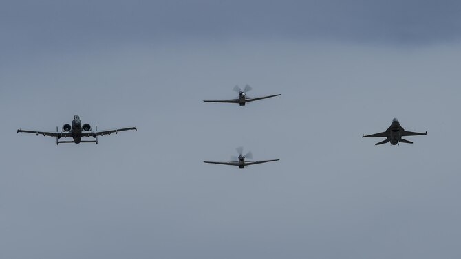 A U.S. Air Force A-10C Thunderbolt II, F-16 Fighting Falcon, a TF-51 and P-51 Mustang fly in formation during the 2017 Heritage Flight Training and Certification Course at Davis-Monthan Air Force Base, Ariz., Feb. 11, 2017. The 20th annual training event has been held at D-M since 2001 and features aerial demonstrations from historical and modern fighter aircraft. (U.S. Air Force photo by Senior Airman Chris Drzazgowski)