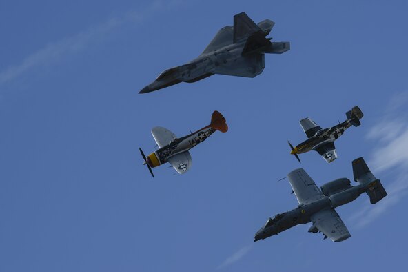 A U.S. Air Force F-22 Raptor, A-10C Thunderbolt II, a P-47 Thunderbolt and P-51 Mustang fly in formation during the 2017 Heritage Flight Training and Certification Course at Davis-Monthan Air Force Base, Ariz., Feb. 11, 2017. The 20th annual training event has been held at D-M since 2001 and features aerial demonstrations from historical and modern fighter aircraft. (U.S. Air Force photo by Senior Airman Chris Drzazgowski)