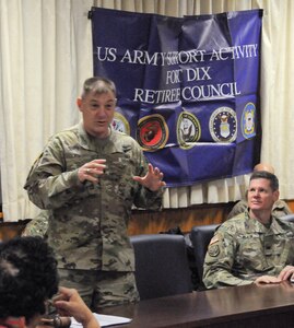 Maj. Gen. Troy D. Kok, commanding general of the U.S. Army Reserve’s 99th Regional Support Command (left), addresses Col. Martin Klein, U.S. Army Support Activity-Fort Dix commander, and members of the ASA-Fort Dix Retiree Council during a meeting Feb. 11 on Joint Base McGuire-Dix-Lakehurst, New Jersey. The Retiree Council meets quarterly to discuss ways in which it can assist military retirees.