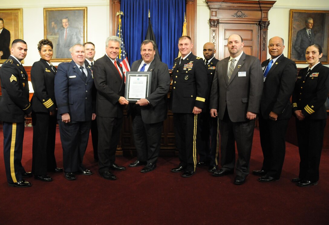 Maj. Gen. Troy D. Kok, commanding general of the U.S. Army Reserve’s 99th Regional Support Command (right of center), meets with New Jersey Governor Chris Christie during an Employer Support of the Guard and Reserve (ESGR) Statement of Support ceremony Feb. 10 at the State House in Trenton, New Jersey. The Statement of Support Program is the cornerstone of ESGR’s effort to gain and maintain employer support, which is critical to maintaining the strength and readiness of Army Reserve and National Guard units.