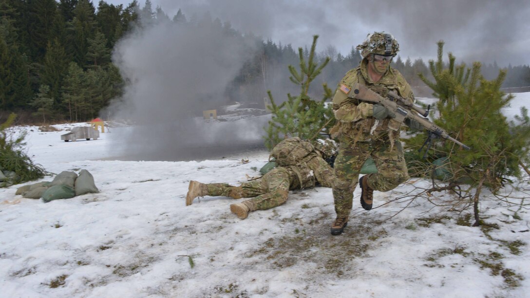 Army paratroopers maneuver as a sniper team during a combined arms live-fire exercise at the 7th Army Training Command's Grafenwoehr Training Area, Germany, Feb. 6, 2017. Army photo by Gerhard Seuffert
