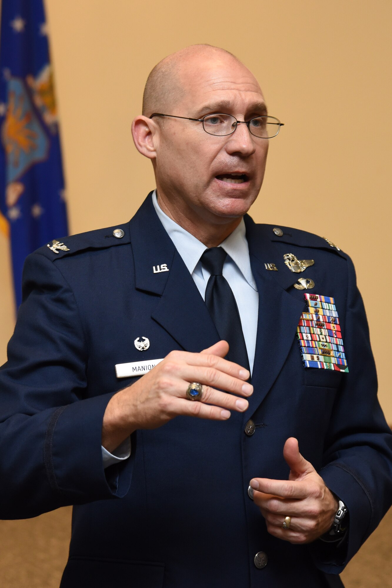 Col. Michael Manion, 403rd Wing commander, addresses wing members at the 403rd Wing commander’s call held Feb. 10, 2017, at Keesler Air Force Base, Mississippi. The colonel discussed topics such as the recent hiring freeze on the federal government, reserve personnel authorization funding, and the upcoming change of command scheduled for this May. (U.S. Air Force photo/Tech. Sgt. Ryan Labadens)