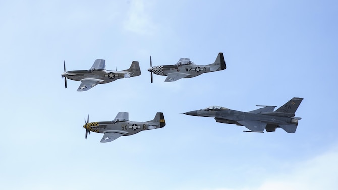 A U.S. Air Force F-16C Fighting Falcon, two P-51 Mustangs and a TF-51 Mustang fly in formation during the 2017 Heritage Flight Training and Certification Course at Davis-Monthan Air Force Base, Ariz., Feb. 12, 2017. The historic aircraft included the P-51 and T-51 Mustangs, the P-40 Warhawk, the P-38 Lightning, the P-47 Thunderbolt, the T-33 Shooting Star and the F-86 Sabre. (U.S. Air Force photo by Airman 1st Class Mya M. Crosby)