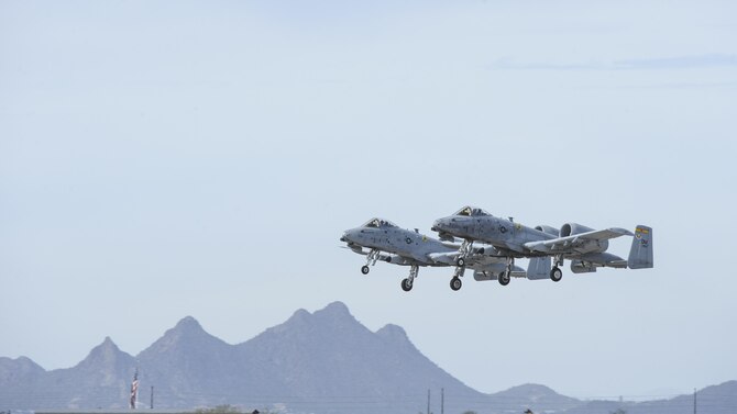 Two U.S. Air Force A-10C Thunderbolt IIs take off during the 2017 Heritage Flight Training and Certification Course at Davis-Monthan Air Force Base, Ariz., Feb. 12, 2017. The historic aircraft included the P-51 and T-51 Mustangs, the P-40 Warhawk, the P-38 Lightning, the P-47 Thunderbolt, the T-33 Shooting Star and the F-86 Sabre. (U.S. Air Force photo by Airman 1st Class Mya M. Crosby)