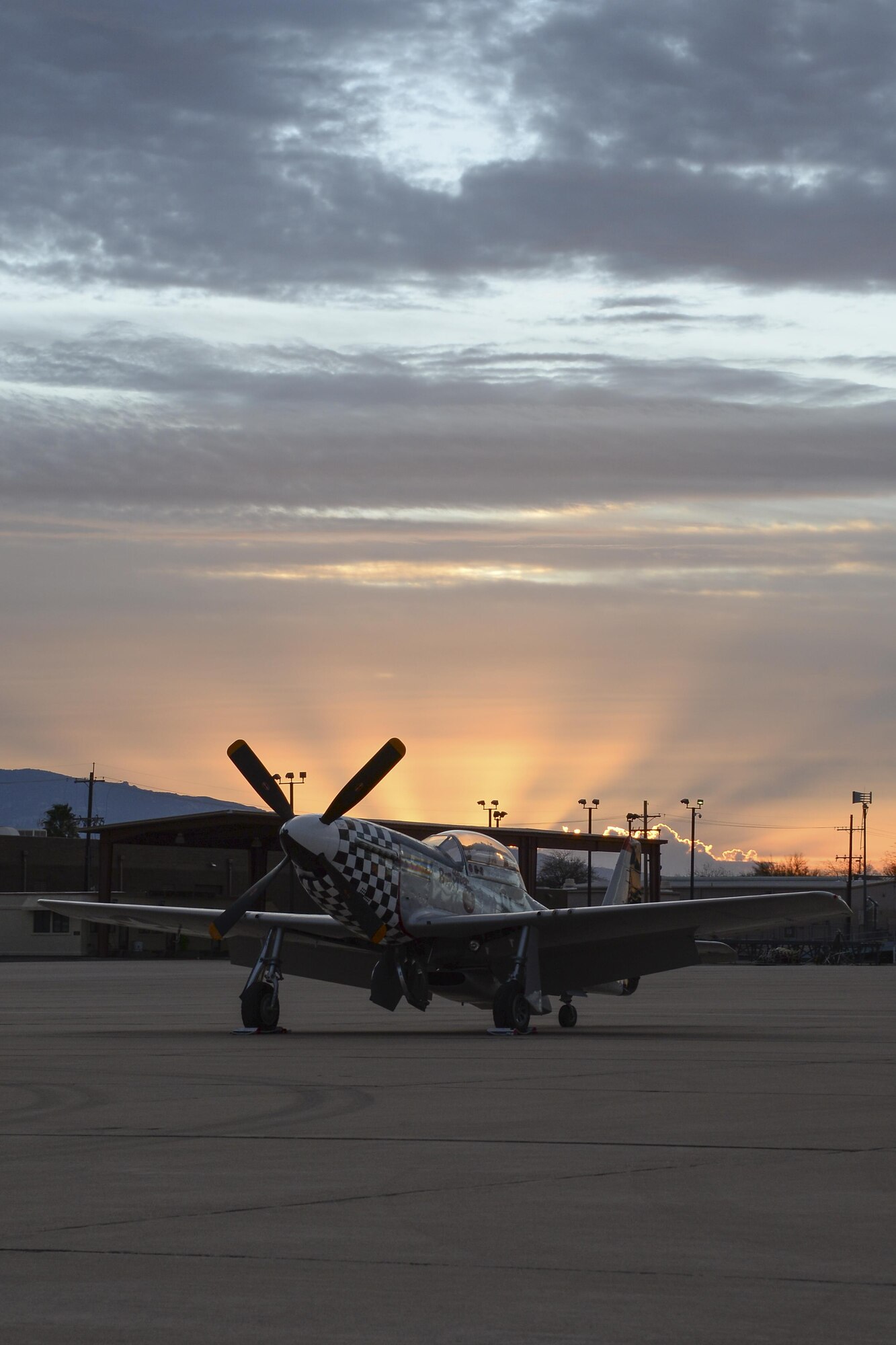 A TF-51 Mustang rests on the flightline during the 2017 Heritage Flight Training and Certification Course at Davis-Monthan Air Force Base, Ariz., Feb. 12, 2017. The annual aerial demonstration training event has been held at D-M since 2001. (U.S. Air Force photo by Senior Airman Ashley N. Steffen)