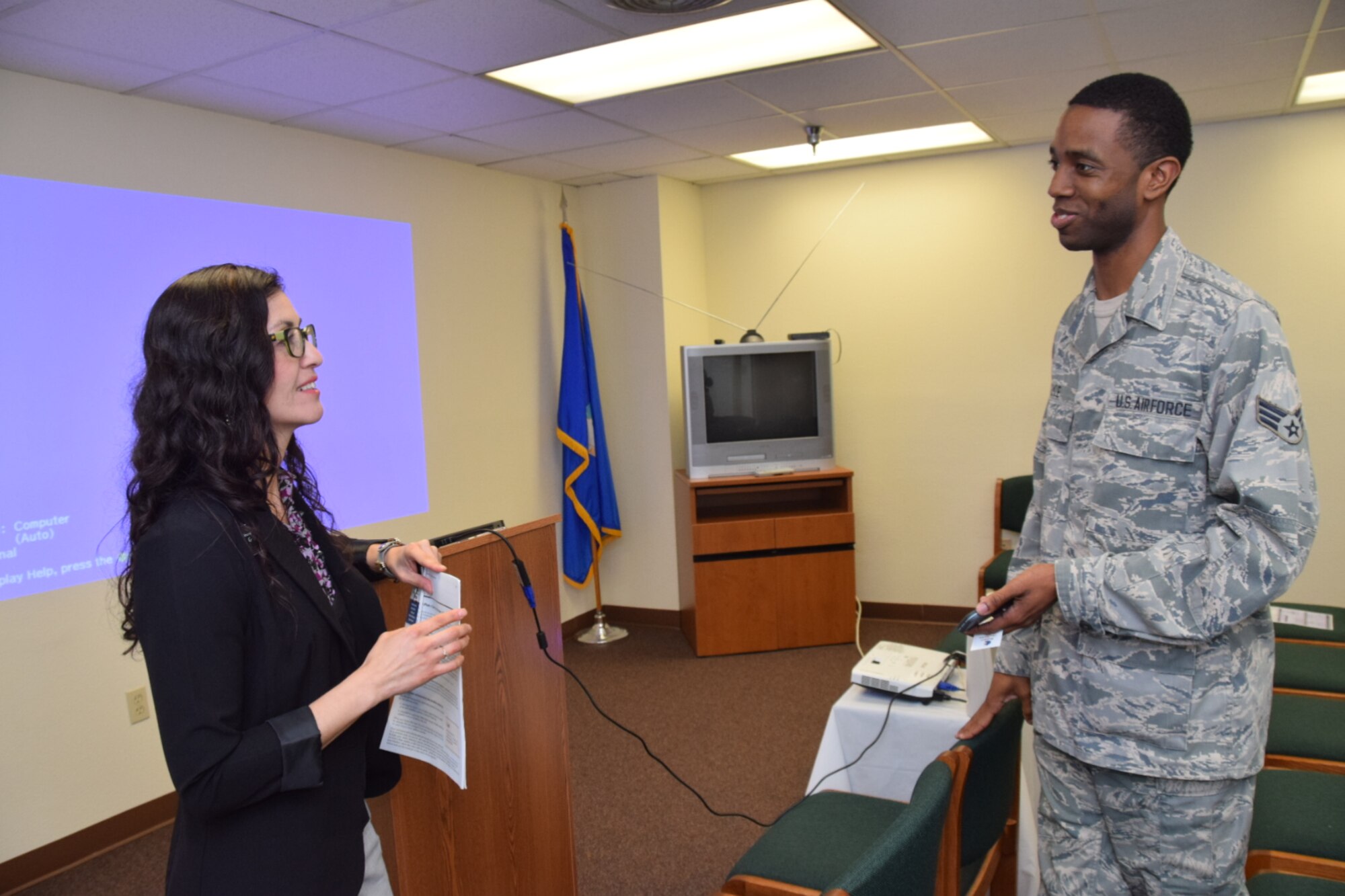 Geremy Chavez, a personal financial counselor talks with Senior Airman Jonathan Lyle, a 433rd Logistics Readiness Squadron logistics planner, about his taxes using the Military One Source on Feb. 12, 2017.  (U.S. Air Force photo/Tech. Sgt. Carlos J. Treviño)