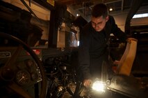 Sgt. Leonard S. Yost inspects vehicles repaired during a reservist training period, Jan. 24, 2017, at Camp Kinser, Okinawa, Japan. The training period was used to integrate reserve and active duty Marines to share knowledge and ideas to improve work productivity. Yost, a native of Hubert, North Carolina, is an intermediate automotive mechanic with Transportation Services Company, Combat Logistics Battalion 25, Combat Logistics Regiment 45, 4th Marine Logistics Group, currently working with 3rd Maintenance Battalion, Combat Logistics Regiment 35, 3rd Marine Logistics Group, III Marine Expeditionary Force. (U.S. Marine Corps photo by Lance Cpl. Jonah Baase)
