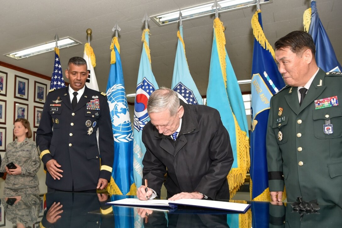 Defense Secretary Jim Mattis signs the guest book at Headquarters, United States Forces Korea and Combined Forces Command, after arriving at United States Army Garrison-Yongsan, South Korea, Feb. 02, 2017. (DOD photo by Army Sgt. Amber I. Smith) 