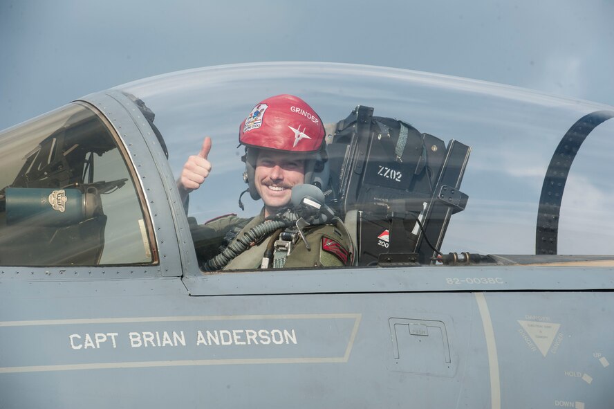 U.S. Air Force 1st Lt. Jordan Carr, 67th Fighter Squadron pilot, gives a thumbs-up as he leaves refueling hot pits during a surge operation Jan. 11, 2017, at Kadena Air Base, Japan. During surge operations, pilots make stops at hot pits to have their aircraft refueled to continue sortie production. (U.S. Air Force photo by Senior Airman Lynette M. Rolen/Released)