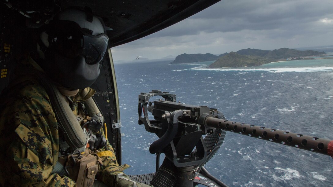 U.S. Marine Corps Lance Cpl. Servando Avila, a crew chief with Marine Light Attack Helicopter Squadron 267, 3rd Marine Aircraft Wing, participates in a Tactical Air Control Party off the coast of Okinawa February 9, 2017. This specific training focused on enhancing efficiency and coordination between air and ground elements, which is crucial to maintain a stronger, more capable forward deployed force of readiness in support of the U.S.-Japan alliance and our regional partners. 