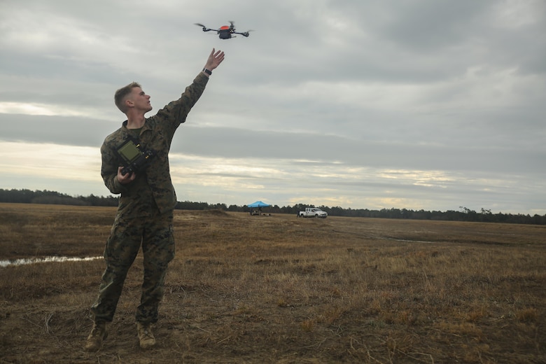 A Marine with Task Force Southwest catches the Instant Eye small unmanned aerial system following a flight at Camp Lejeune, N.C., Feb. 8, 2017. The drone allows operators to record surveillance and execute reconnaissance in small, confined areas which are otherwise inoperable with larger aircraft. Approximately 300 Marines are assigned to Task Force Southwest, whose mission will be to train, advise and assist the Afghan National Army 215th Corps and 505th Zone National Police. (U.S. Marine Corps photo by Sgt. Lucas Hopkins)