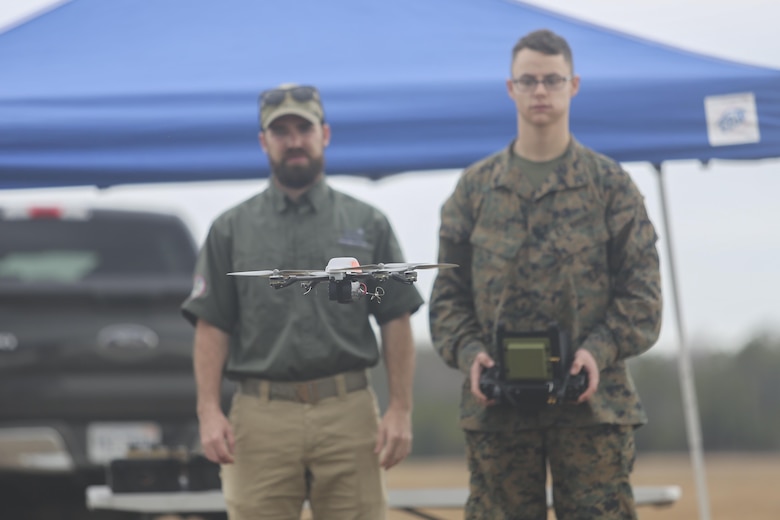 A Marine with Task Force Southwest flies the Instant Eye small unmanned aerial system at Camp Lejeune, N.C., Feb. 8, 2016. The Instant Eye is the first drone in the Marine Corps’ repertoire that can launch and land without a runway or manpower assistance. Approximately 300 Marines are assigned to Task Force Southwest, whose mission will be to train, advise and assist the Afghan National Army 215th Corps and 505th Zone National Police. (U.S. Marine Corps photo by Sgt. Lucas Hopkins)