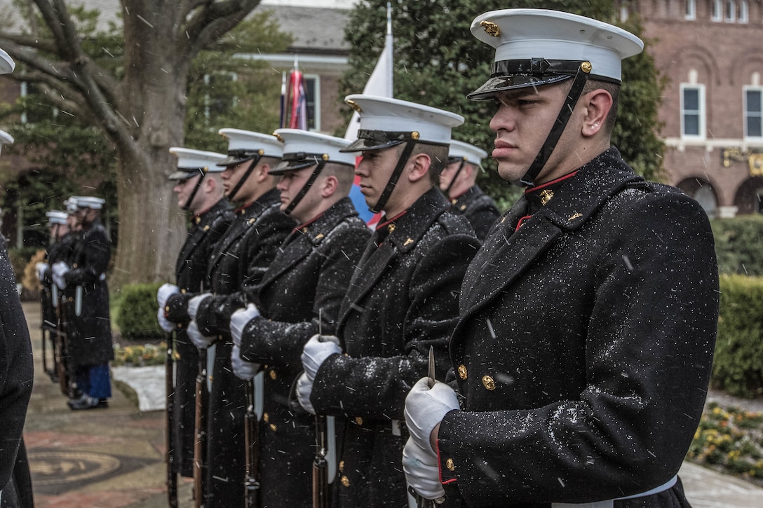 U.S. Marines with Marine Barracks Washington stand at ease during an honors ceremony for Lt. Gen. Lee Sang-Hoon, commandant of the Republic of Korea Marine Corps, at the Home of the Commandants, Washington, D.C., Feb. 9, 2017. Commandant of the Marine Corps Gen. Robert B. Neller hosted Sang-Hoon for an honors ceremony and dinner.