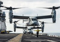 GULF OF ADEN (Feb. 12, 2017) Aviation Boatswain’s Mate (Handling) 3rd Class Jalisa Hill, from Spring, Texas, signals for an MV-22B Osprey, assigned to Marine Medium Tiltrotor Squadron (VMM) 163 (Reinforced), to land on the flight deck of the amphibious assault ship USS Makin Island (LHD 8). Makin Island is deployed in the U.S. 5th Fleet area of operations in support of maritime security operations designed to reassure allies and partners, and preserve the freedom of navigation and the free flow of commerce in the region. (U.S. Navy photo by Mass Communication Specialist 3rd Class Devin M. Langer)