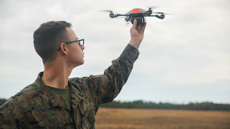 A Marine with Task Force Southwest prepares to launch the Instant Eye small unmanned aerial system at Marine Corps Base Camp Lejeune, North Carolina, Feb. 8, 2017. Due to its compact size, the Instant Eye will allow Marines to capture imagery and conduct reconnaissance in buildings and other confined areas. Task Force Southwest is comprised of approximately 300 Marines, whose mission will be to train, advise and assist the Afghan National Army 215th Corps and 505th Zone National Police. 