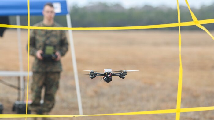 A Marine with Task Force Southwest flies the Instant Eye small unmanned aerial system through an obstacle at Marine Corps Base Camp Lejeune, North Carolina, Feb. 8, 2017. Unlike larger drones, the Instant Eye can maneuver in tightly confined spaces, such as buildings and around corners, to record surveillance and conduct reconnaissance. Task Force Southwest is comprised of approximately 300 Marines, whose mission will be to train, advise and assist the Afghan National Army 215th Corps and 505th Zone National Police. 