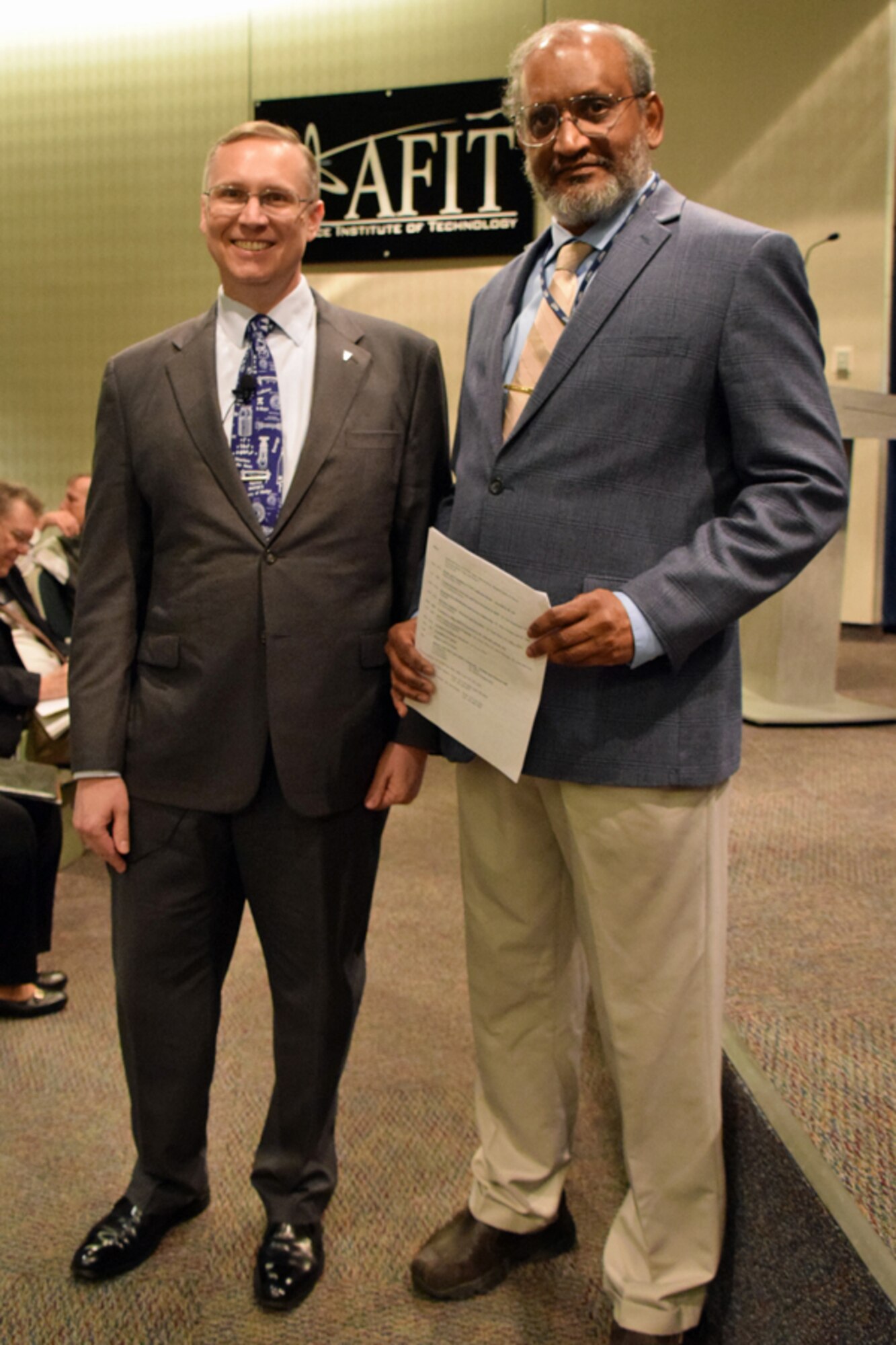 Dr. Rodney Miller, senior leader executive and chief scientist for Air Force Global Strike Command and Dr. Sivaguru Sritharan, provost and vice chancellor, Air Force Institute of Technology pose for a photo after Miller's presentation.   Miller is an AFIT alum who earned a Master of Science in Nuclear Engineering in 1993 and a doctorate in Applied Physics in 1998.