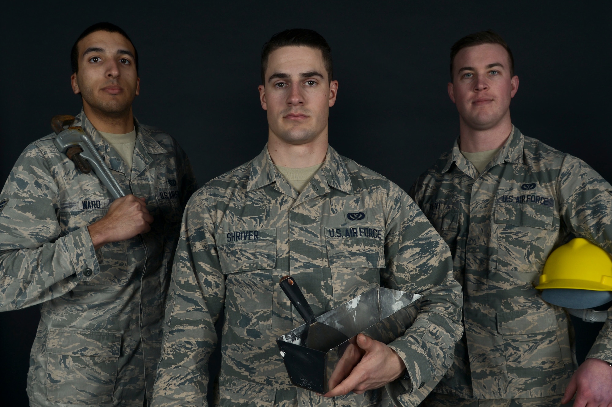 Members of the 5th Civil Engineer Squadron pose for a photo at Minot Air Force Base, N.D., Feb. 2, 2017. The CE Smart Team is responsible for improving various facilities on base by completing work orders by request and fixing any problems before they arise. (U.S. Air Force photo/Airman 1st Class Jessica Weissman)