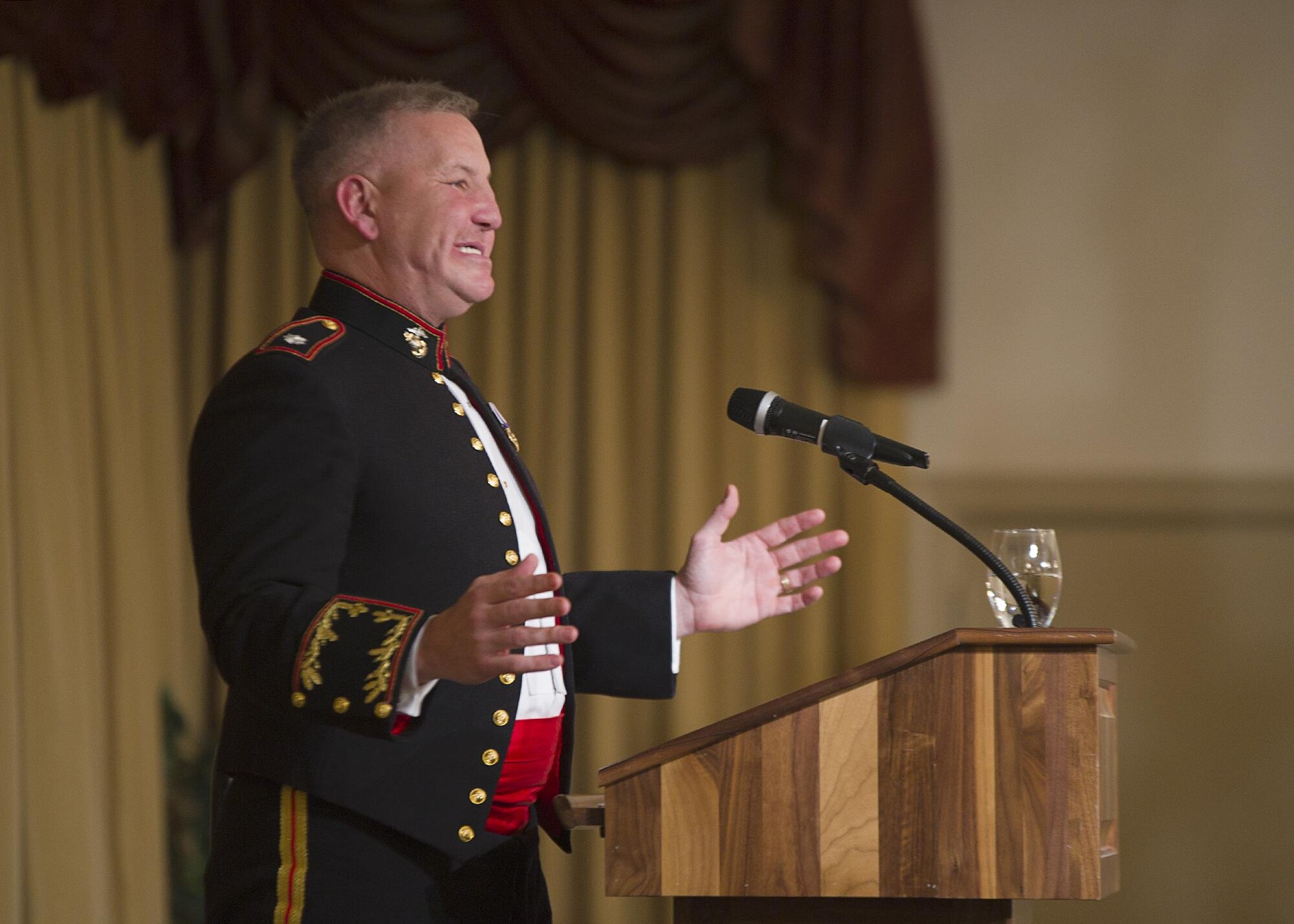 Lt. Col. (Ret.) Justine Constantine, a former Marine and attorney, speaks to the crowd at the 514th Annual Awards Banquet at Tommy B's Activity Center Feb. 11. In 2006, Constantine was shot in the head by a sniper while deployed to Iraq. He was declared dead, before he was saved by quick and courageous actions of his fellow Marines and a Navy Corpsman, who refused to give up on him.